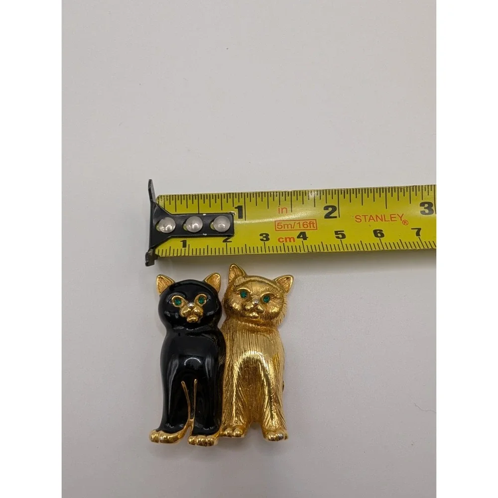 Vintage Swarovski Cat Brooch Black Enamel Gold Tone Green Crystal Eyes